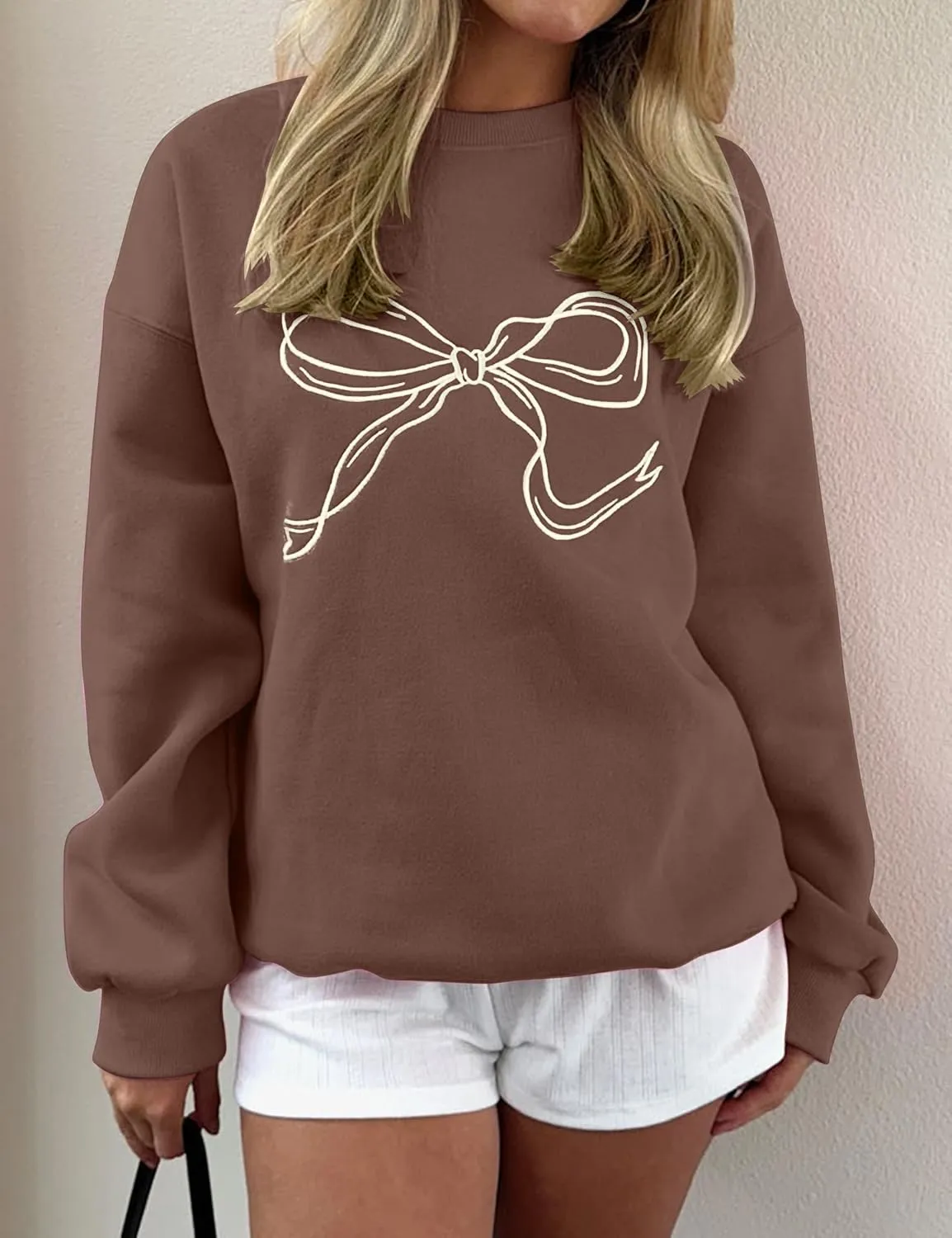 Ythomm Womens Bow Graphic Sweatshirts Oversized Crewneck Drop Shoulder Pullover Sweatshirt Long Sleeve Tops 2024 Fall Outfit